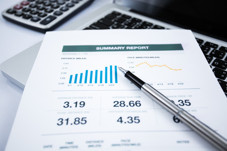 Businessman analyzing investment charts with laptop. Accountingの写真素材