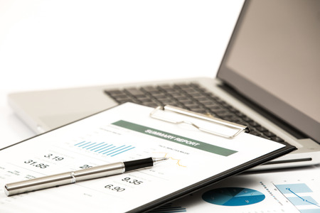 Businessman analyzing investment charts with laptop. Accountingの写真素材