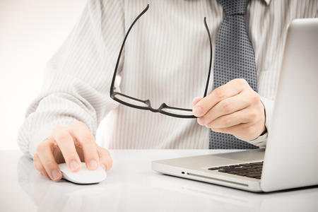 Close-up of Businessman using laptopの写真素材