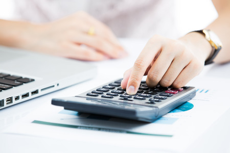 Hands of business woman with laptop computer keyboardの写真素材