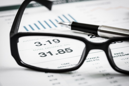 closeup glasses on financial report. Accountingの写真素材