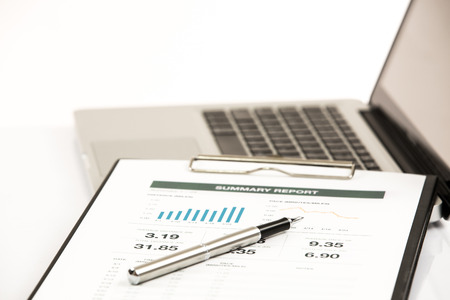 Businessman analyzing investment charts with laptop. Accountingの写真素材
