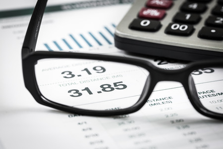 closeup glasses on financial report. Accountingの写真素材
