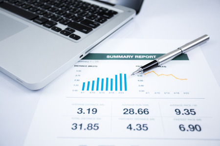 Businessman analyzing investment charts with laptop. Accountingの写真素材