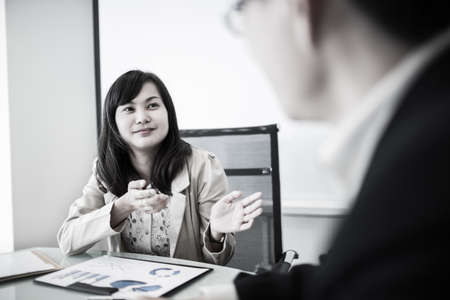 Successful young business executives meeting at the office.Asianの写真素材