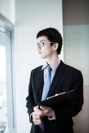 happy young business man work in modern office.Asianの写真素材