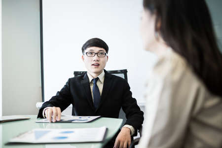 Successful young business executives meeting at the office.Asianの写真素材