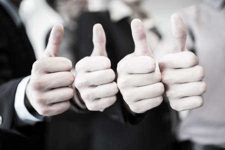 Group of hands with thumbs up expressing positivity.Asianの写真素材