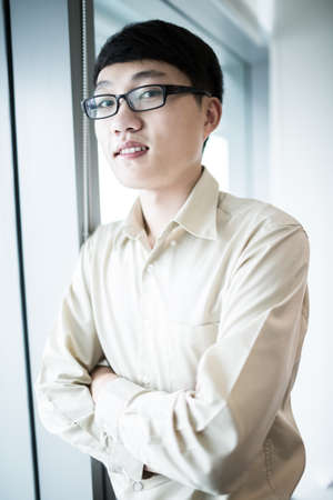Portrait of a businessman looking at the window.Asianの写真素材