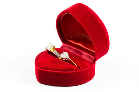 image of wedding rings in a gift box on white backgroundの写真素材