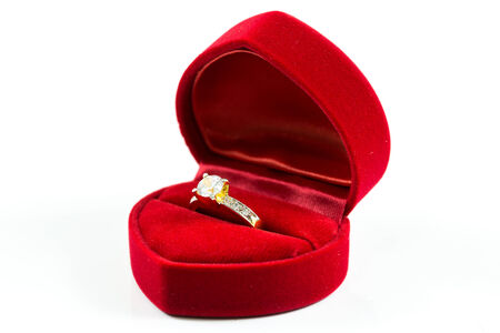 image of wedding rings in a gift box on white backgroundの写真素材