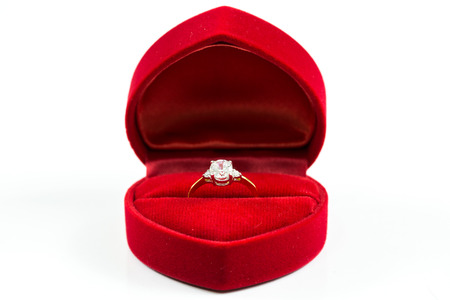 image of wedding rings in a gift box on white backgroundの写真素材