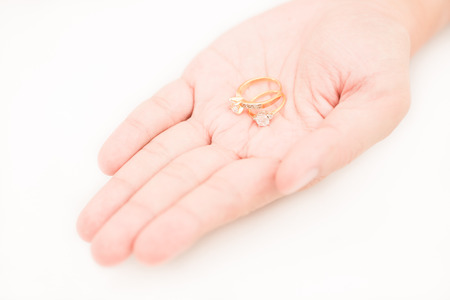 Wedding rings in handの写真素材