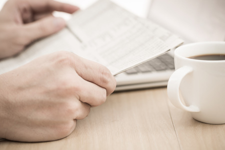 Businessman analyzing investment charts with laptop. Accountingの写真素材