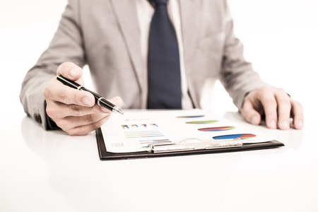 Businessman analyzing investment charts with laptop. Accountingの写真素材