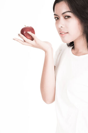 portrait of a lovely young woman eating healthyの写真素材