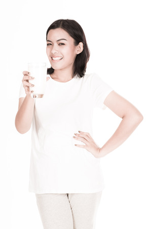 portrait of a lovely young woman eating healthyの写真素材