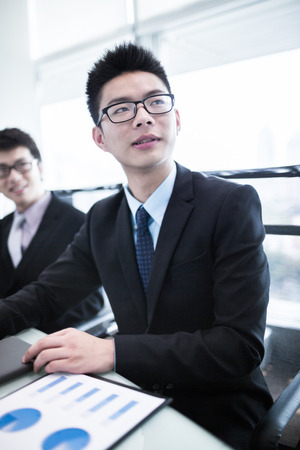Business people sitting together in a meeting.Asianの写真素材