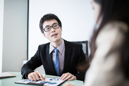 Successful young business executives meeting at the office.Asianの写真素材