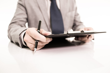 Businessman analyzing investment charts with laptop. Accountingの写真素材