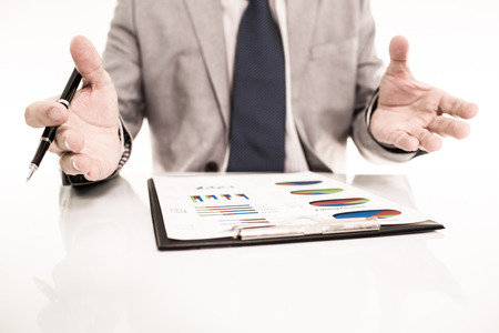 Businessman analyzing investment charts with laptop. Accountingの写真素材