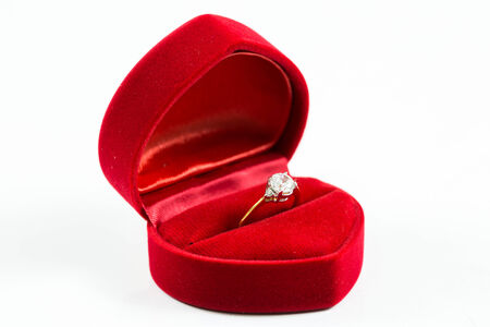 image of wedding rings in a gift box on white backgroundの写真素材