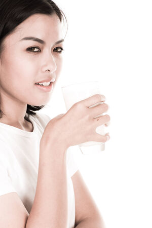portrait of a lovely young woman eating healthyの写真素材