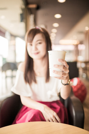 Beautiful Woman Drinking Coffeeの写真素材