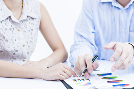 Business people discussing during a meeting on tableの写真素材