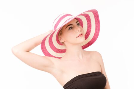 Beautiful woman in a hatの写真素材