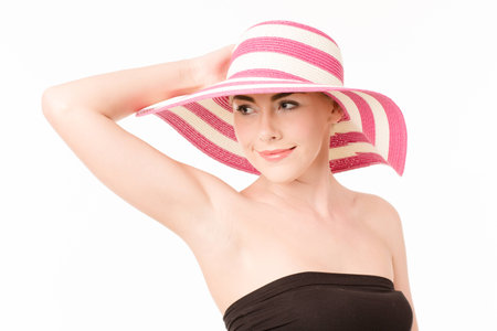 Beautiful woman in a hatの写真素材