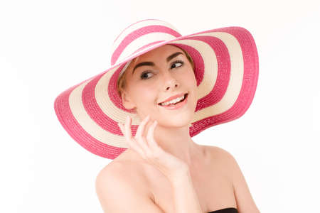 Beautiful woman in a hatの写真素材