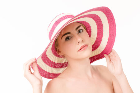 Beautiful woman in a hatの写真素材