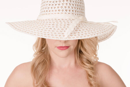 Portrait of attractive sexy woman with hatの写真素材