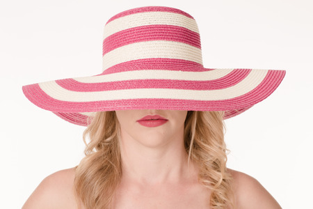 Portrait of attractive sexy woman with hatの写真素材