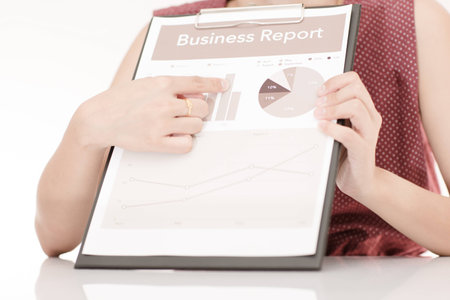 woman hand with pen and business report. Accountingの写真素材