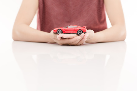 Woman hand with holding red carの写真素材