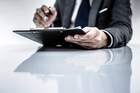 business report and man hand. Accountingの写真素材