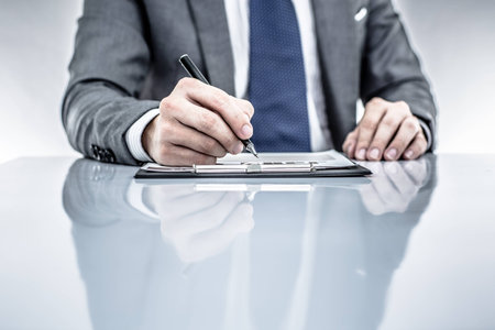 business report and man hand. Accountingの写真素材