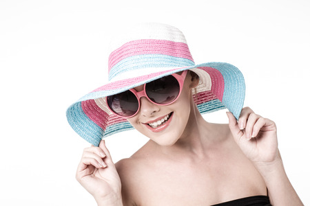 Beautiful woman in a hatの写真素材