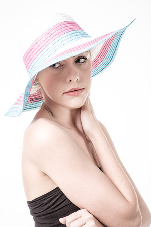 Beautiful woman in a hatの写真素材