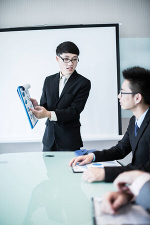 Business man making a presentation at the office.Asianの写真素材