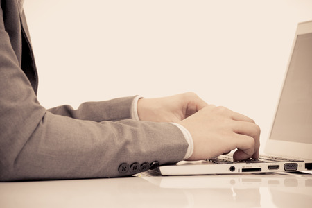 Businessman analyzing investment charts with laptop. Accountingの写真素材