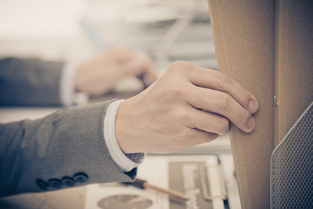 Businessman analyzing investment charts with laptop. Accountingの写真素材