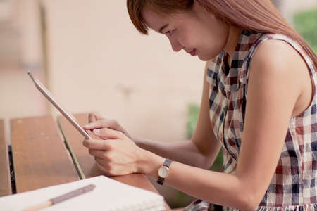 Close Up woman using tabletの写真素材
