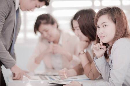 Successful business meeting with a group of people at the office.Asianの写真素材