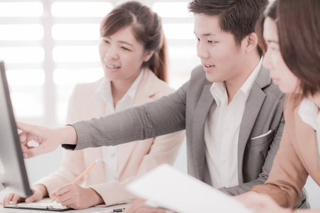 Successful business meeting with a group of people at the office.Asianの写真素材