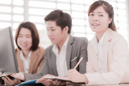 Successful business meeting with a group of people at the office.Asianの写真素材