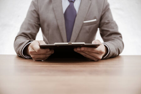 Business report and man hand. Accountingの写真素材