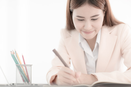 young asian businesswoman working in officeの写真素材